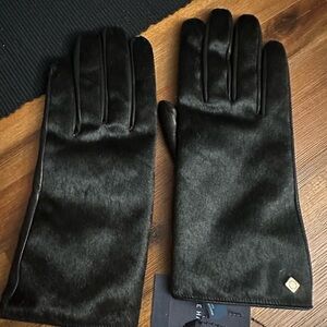 Woman’s Cole Haan hair calf/lamb skin black gloves. Wool and cashmere lined